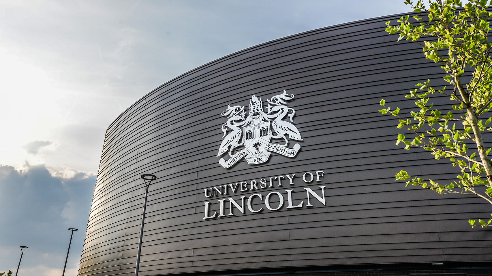 A building with the University crest on the side