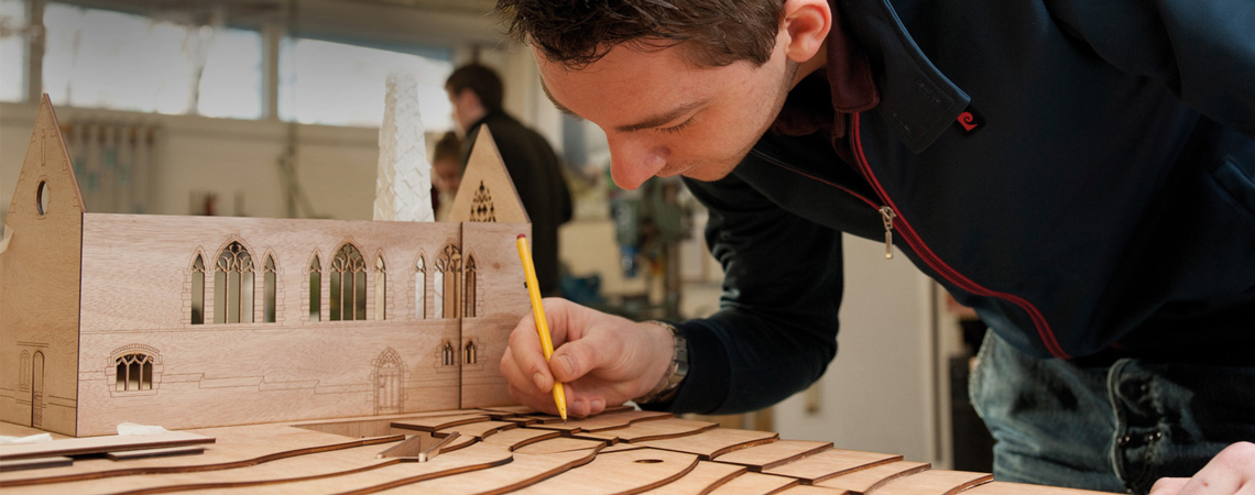 A student working on a model building