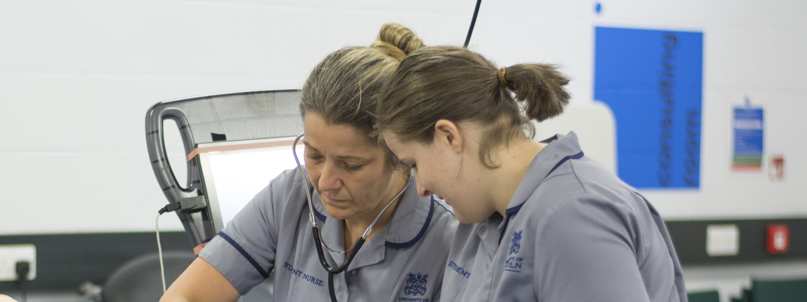 Two nurses working together