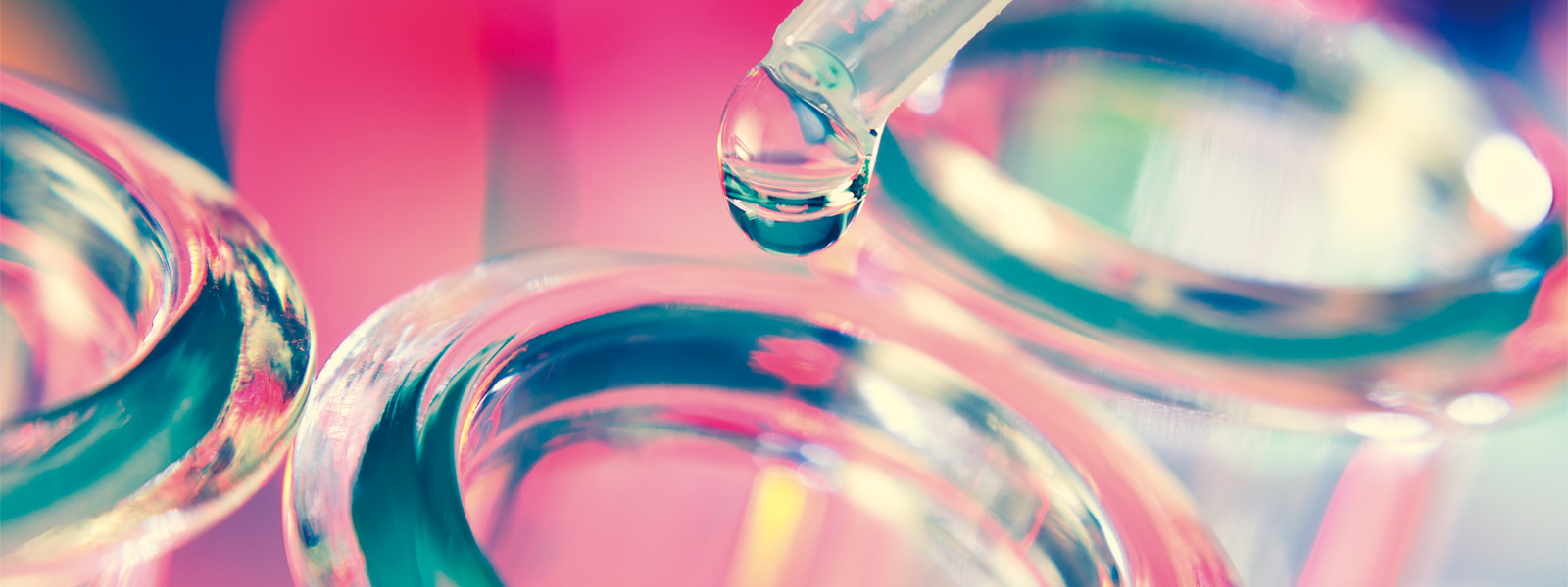 A sample being put into a test tube
