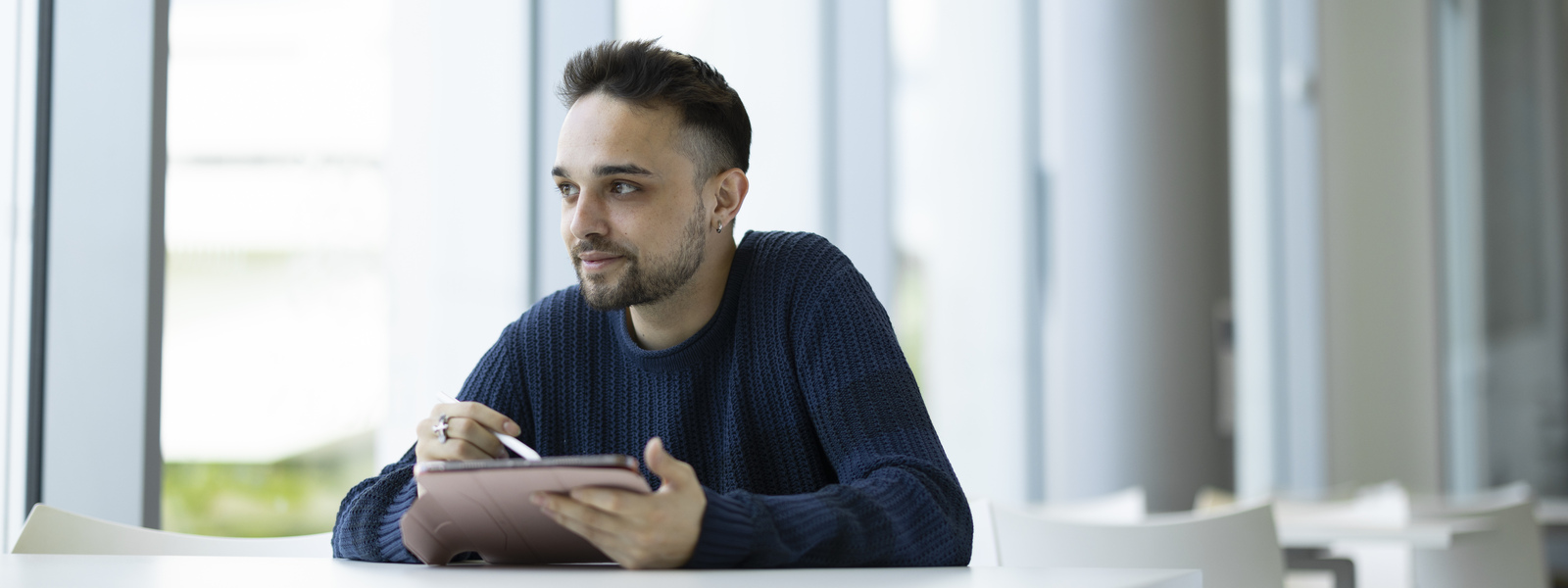 A student using a tablet device