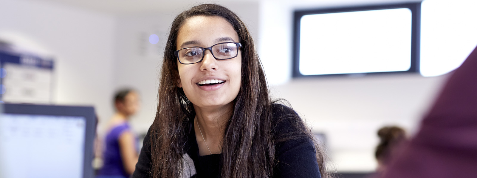 Female student working in a classroom