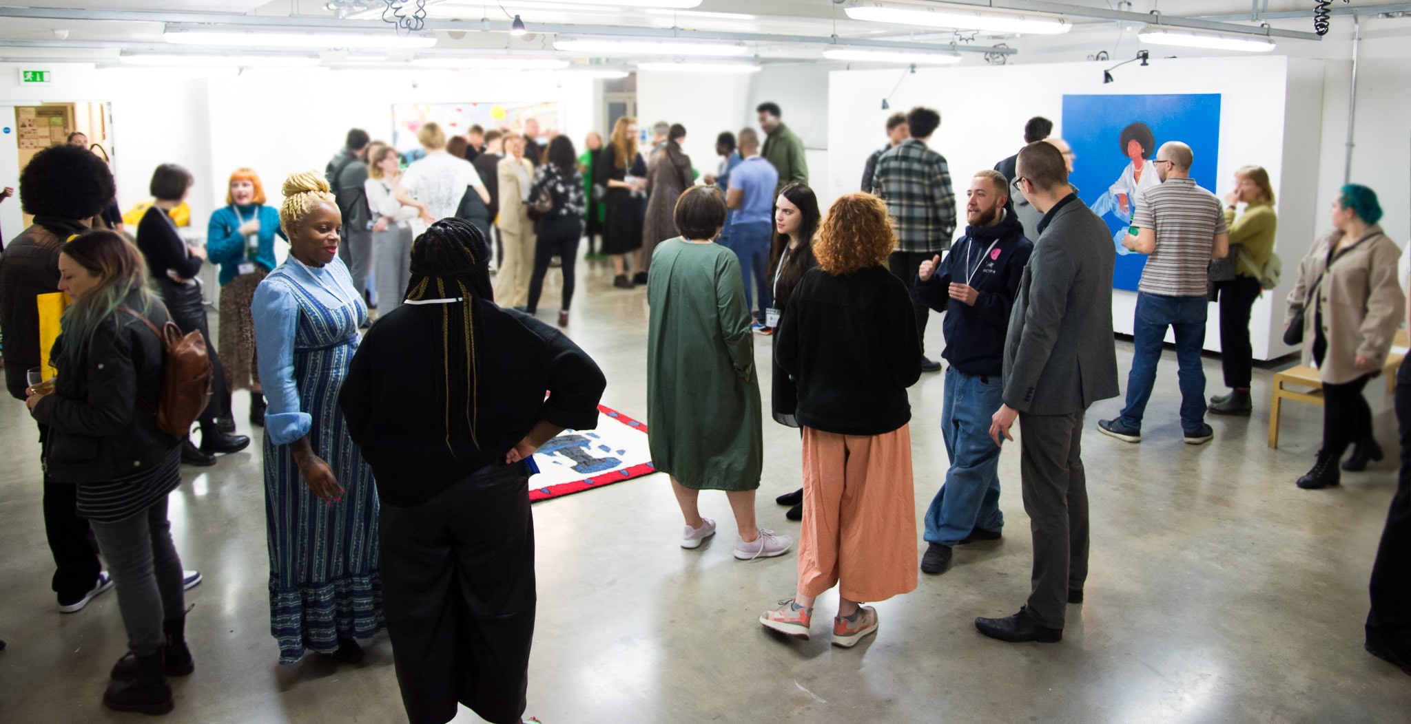 Visitors at an art exhibition