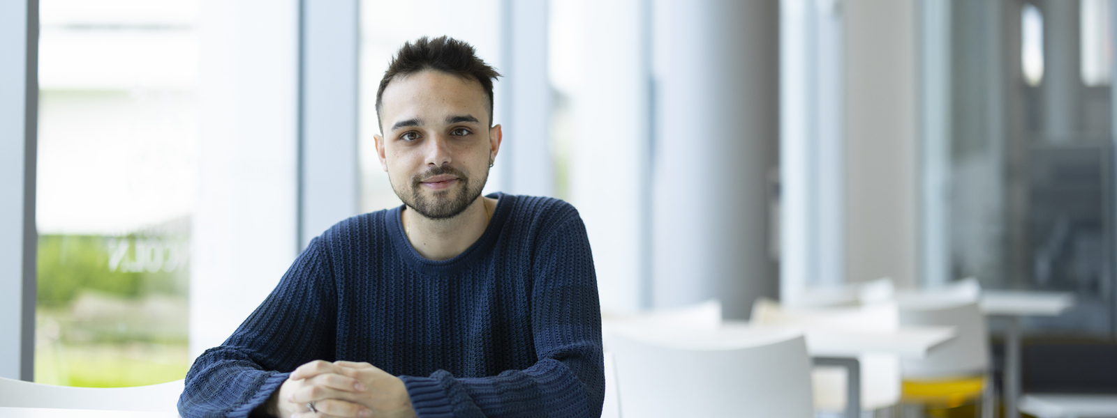A student in the Isaac Newton Building