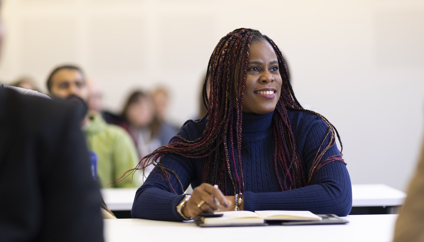 A student listening in a seminar