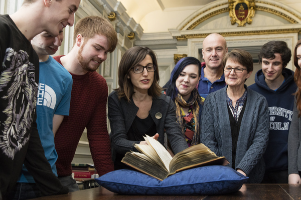 Students and staff in the Wren Library