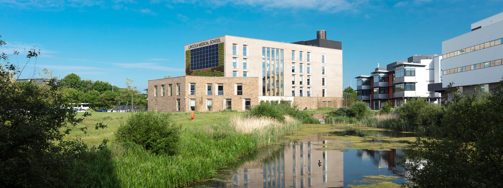 Brayford Pool Campus with trees and buildings