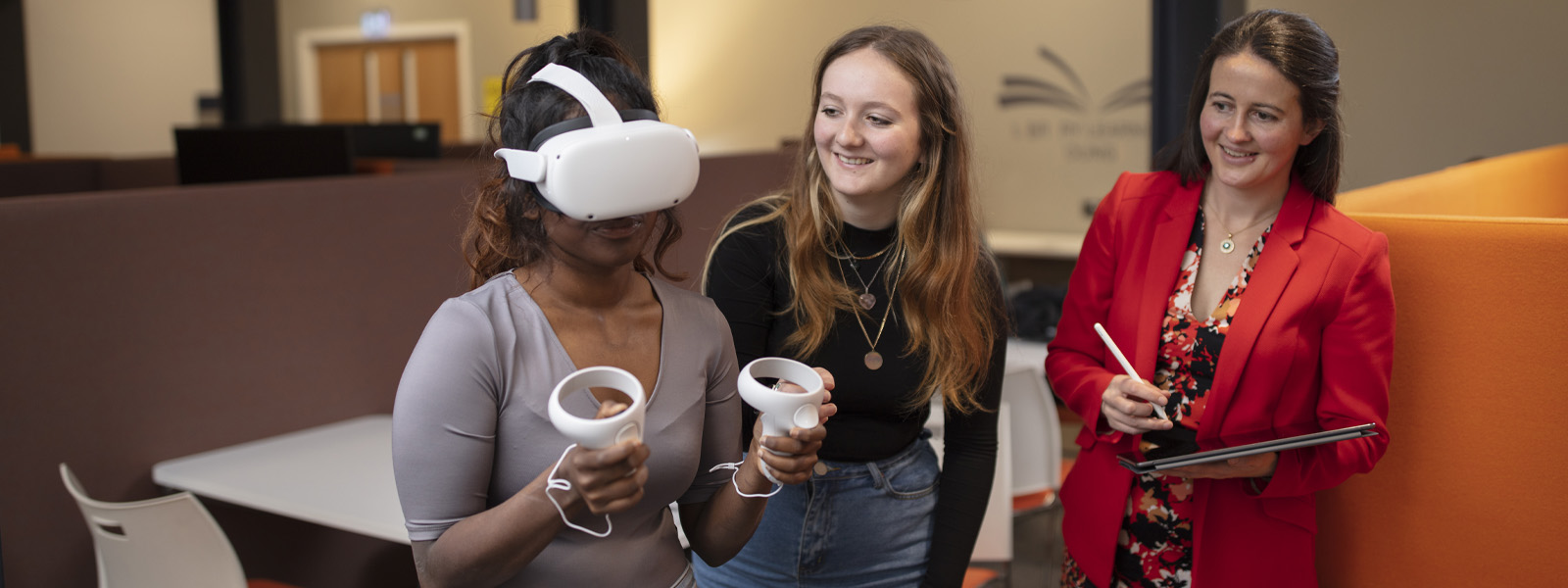 A student using VR equipment in a classroom