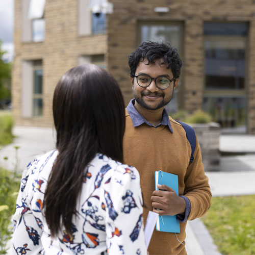 Students chatting on the University campus
