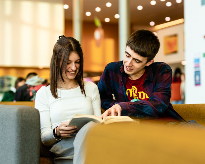 Students reading a book