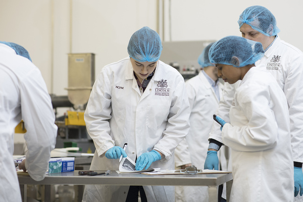 People working in a food laboratory