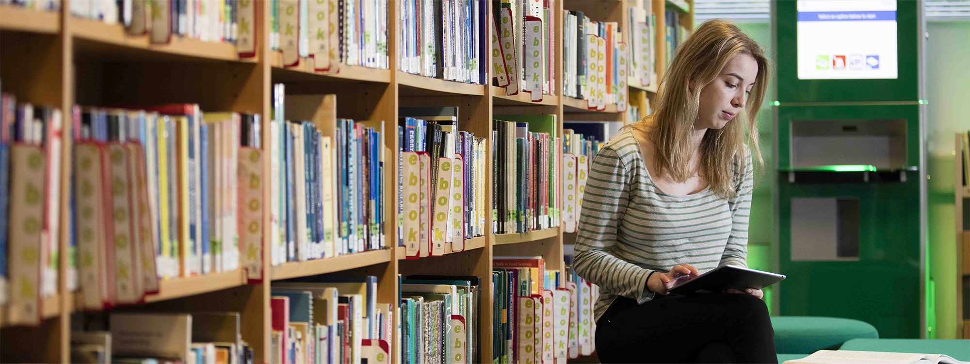 A student reading a book