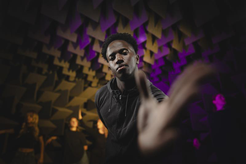 A student in an anechoic chamber